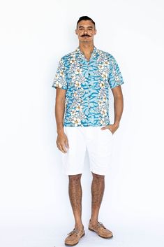 This is an authentic Hawaiian shirt! Handmade on the island of Oahu in the city of Honolulu. Hawaii's the proud state flower, the Hibiscus, with complimentary native ferns, and finished with real coconut buttons. A masterpiece in simplicity and design. We add a special unique finishing touch to our shirts, real coconut buttons. Yes, we can make buttons from coconuts. And we did. Each button is different from the next, just as each wave that hits the shore is different from the last. They're unique, but oh so similar.  Available in small (S), medium (M), large (L), extra-large (XL), 2XL,3XL,4XL,5XL,6XL,7XL. Colors available in navy, red, and light blue. Matching Muumuu Dresses: https://www.etsy.com/listing/812754038/mothers-day-made-in-hawaii-usa-hawaiian?ref=shop_home_active_1 Check out mo Cotton Collared Shirt With Hibiscus Print, Collared Cotton Shirt With Hibiscus Print, Cotton Hibiscus Print Collared Shirt, Blue Cotton Hawaiian Shirt With Hibiscus Print, Relaxed Fit Cotton Hawaiian Shirt With Hibiscus Print, Cotton Top With Hibiscus Print And Camp Collar, White Collared Camp Shirt For Beach Season, Hawaiian Cotton Floral Print Tops, Relaxed Fit White Short Sleeve Shirt For Beach Season