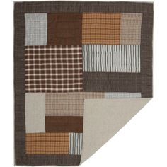 a brown and white patchwork rug