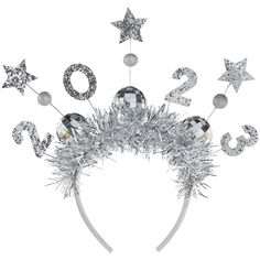 a silver headband with numbers and stars on it