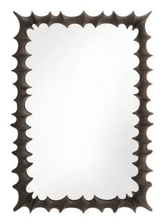 a square mirror with spikes on the edges and a white backround in the middle