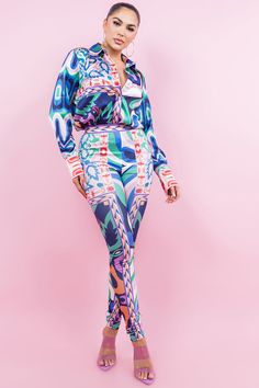 Satin button down blouse and high waist legging set Chic Abstract Print Pants For Spring, Spring Long Sleeve Printed Pant Set, Casual Multicolor Long Sleeve Pant Set, Spring Stretch Pants With Graphic Print, Chic Multicolor Pant Set For Spring, Multicolor Trousers Sets For Spring, Spring Multicolor Trousers Sets, Trendy Multicolor Workwear Sets, Trendy Multicolor Sets For Workwear