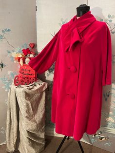 "1960 vintage, red velvet coat with an, attached, neck scarf and, great, 21/2\" covered buttons. The sleeves are 3/4 length and bell out, slightly. The cot is lined in red. There are two, bound, pocket openings; the attention to details shows. Bust 44\", hips 48\", length from shoulders to hem 40\" dry clean" Elegant Red Costume Outerwear, Vintage Red Outerwear For Evening, Jackie Brown, Velvet Coat, Prairie Dress, Neck Scarf, Neck Scarves, Covered Buttons, Red Velvet