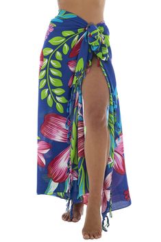 VIBRANT PRINT. Trimmed with boho fringe on two sides, it has a fun tropical look COCONUT SHELL INCLUDED FOR EASY TYING. Generously sized at 67” x 45”, this swimsuit coverup will fit most figures. Sarongs for women are perfect for the beach, poolside, a cruise, backyard party, or dress it up for a summer night out WEAR YOUR SARONG IN A VARIETY OF WAYS! Wear as a bathing suit bikini cover up, a comfortable wrap skirt, sexy pareo dress, sleeveless kimono or as a beautiful shawl. Also makes a fun be Blue Bottoms For Beach Cover-up In Beach Season, Tropical Tie-side Sarong For Vacation, Tropical Vacation Sarong With Tie-side, Bohemian Floral Print Beach Bottoms, Bohemian Floral Beach Bottoms, Tropical Tie-side Sarong For Pool, Blue Hawaiian Style Bottoms For Summer, Blue Hawaiian Summer Bottoms, Hawaiian Style Blue Bottoms For Summer