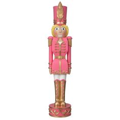 a pink and gold nutcracker statue on a white background