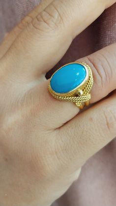 This item is Handmade 18K Gold Women Ring With Turquoise Stone  , Gold Oval Design Handcraft Ring , Gold Women Jewellery , Gift For Her , Gift Ideas ITEM DETAILS  Weight and Size : This product is 7,80 grams. Orijin : Made in Turkey Gender : Female  Material: 18K Gold -Turquoise Stone  PACKAGING: Your product  will be packed in a special  box, carefully. CUSTOMER SERVICE If you have any questions, please do not hesitate to be in contact  with me , I will be too happy to answer your all questions. ✔ Ready to Ship in 1-3 Business Days ✔ Shipping  3-5 business days with free shipping. https://www.etsy.com/your/shops/NoraFineJewelry/tools/listings/1569224059 Gold Oval Turquoise Ring Gift, Oval Gold Turquoise Ring Gift, Handmade Yellow Gold Turquoise Ring, Handmade Turquoise Ring In Yellow Gold, Luxury Handmade Oval Rings, Gold Oval Turquoise Ring For Anniversary, Oval Gold Turquoise Ring Fine Jewelry, Handmade Turquoise Ring For Formal Occasions, Luxury Handmade Oval Cabochon Ring