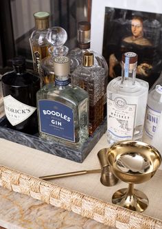 an assortment of liquor bottles on a table