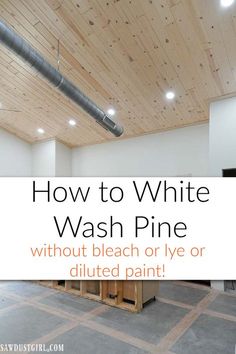 a white wash pine ceiling in an unfinished room