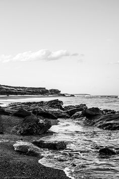 a black and white photo of the ocean