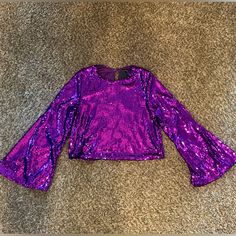 Perfect For College Game Day! Purple Sequinned Blouse With Flare Sleeves New With Tags, Purchased At A Boutique For A Game I Ended Up Missing Royal Purple - Texas Christian, Abilene Christian, Louisiana State, Kansas State, Clemson, Niagara Excellent, New Condition Cropped Fit Measurements In Pictures Festive Purple Blouse Piece With Sequins, Purple Sequined Blouse Piece For Party, Fitted Purple Embellished Blouse Piece, Glamorous Purple Sequin Top, Purple Sequin Top, White Tunic Blouse, Crushed Velvet Top, Floral Lace Blouse, Brown Blouse