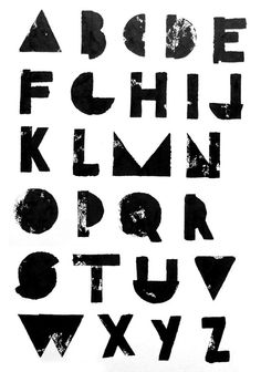 an old black and white type of alphabet