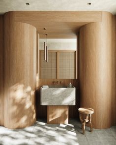 a bathroom with wooden walls and a white sink