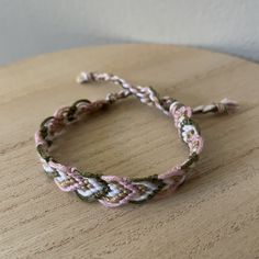 A handmade bracelet or anklet woven with shades of white, pink, and green colors. A friendship or statement bracelet perfect for this summer! Approx. 9 inches/ 30 centimeters long. Made in a smoke free, pet free home. Cheap Bohemian Pink Braided Bracelets, Pink Bohemian Bracelets For Spring, Pink Woven Jewelry For Friendship, Trendy White Handmade Braided Bracelets, Casual Pink Braided Friendship Bracelets, Trendy White Handmade Braided Bracelet, Casual Handmade White Friendship Bracelets, Casual White Handmade Friendship Bracelets, Casual Handmade White Friendship Bracelet