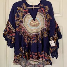 Anthropologie Blouse-New With Tag And Never Been Worn! Bohemian Blue V-neck Tops, Blue V-neck Blouse For Brunch, Blue Tunic Tops For Fall, Summer V-neck Rayon Blouse, Blue Floral Print V-neck Blouse, Bohemian Short Sleeve Tops For Brunch, Casual Boho Print Tunic Top, Long Sleeve Summer Blouse In Blue, Casual Boho Print Rayon Tops