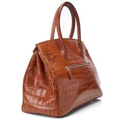 Extraordinary, exclusive creations, meticulously handcrafted by an Austrian-born master craftsman in South Africa. Made from genuine crocodile skin sourced through Hermes Cuir Précieux, the epitome of elegance and prestige Original Retail Price: $12,000 Large Hermes Birkin 35-style bag. Pre-owned Cognac Color Genuine Nile Crocodile Skin ( Hermes cuir precieux) Tote with side straps and turn-lock hanging key fob croc skin-wrapped padlock with a set of keys two rounded top handles internal zip poc Classic Brown Bag With Crocodile Pattern, Luxury Brown Crocodile Pattern Shoulder Bag, Luxury Brown Shoulder Bag With Crocodile Pattern, Classic Everyday Luxury Bag With Crocodile Pattern, Classic Bags With Crocodile Pattern For Everyday Luxury, Luxury Brown Crocodile Pattern Bag, Luxury Italian Brown Shoulder Bag, Cognac Leather Bag With Crocodile Pattern, Leather Bags With Crocodile Pattern In Cognac