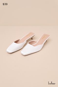 All of your special occasion styles will be absolute perfection once you pair them with the Lulus Auroette White Satin Kitten Heel Mule Pumps! These attention-worthy heels have a sleek satin fabrication that shapes a tapered-off, pointed-toe upper with a square-cut collar. An eye-catching, sculpted kitten heel complete the simple slide-on design. Available in whole sizes only. 1. 5" sculpted heel. Cushioned insole. Felted rubber sole has nonskid markings. Man made materials. Imported. Lulus | Auroette White Satin Kitten Heel Mule Pumps. Elegant Satin Heels For Wedding Guests, Summer Wedding Shoes With Sculpted Heel And Almond Toe, Feminine Satin Pointed Toe Heels, Feminine Satin Heels For Evening, Summer Formal Wedding Shoes With Sculpted Heel, Elegant Summer Wedding Shoes With Sculpted Heel, Feminine Satin Heels For Formal Occasions, White Satin Evening Heels, Formal Wedding Shoes With Sculpted Heel For Summer