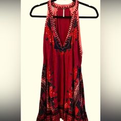 Cute Summer Time Halter Mini Dress Or Tunic With Ornate Paisley Design In Burgundy, Pink, Red, Purple, And Navy. Darling With A Jean Jacket And Jeans, Or Worn As A Mini Dress On Its Own. Red Bohemian V-neck Mini Dress, Bohemian Red V-neck Mini Dress, Red Sleeveless Dresses With Boho Print, Red Bohemian Sundress For Festivals, Red V-neck Printed Sundress, Red Sleeveless Mini Dress For Festival, Flowy Red Printed Boho Dress, Red Sleeveless Bohemian Dress, Red Bohemian Mini Dress