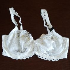 White Lace Bra With Cream Colored Beading And Rhinestones In The Center. Elegant White Summer Bra, White Fitted Bra For Party, Fitted White Bra For Party, Fitted Lace Trim Bra For Wedding, Elegant Party Bra By Victoria's Secret, Victoria's Secret Elegant Party Bra, Elegant Victoria's Secret Party Bra, Sheer Fitted Wedding Bra, White Lace Wedding Bra