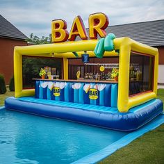 an inflatable bar set up on the side of a swimming pool