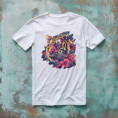 Unleash your wild side with this eye-catching cotton tee, adorned with a striking graphic of a tiger in a kaleidoscope of floral splendor. Each shirt is crafted from the softest cotton, ensuring you stay comfortable whether you're on the move or lounging at home. The unique design blends a touch of nature's beauty with a dash of vibrant '80s flair, perfect for standing out in any crowd. This isn't just a t-shirt, it's a statement piece that celebrates the spirit of the wilderness with a floral t Multicolor Graphic Tee With Graphic Print, Multicolor Graphic Tee With Front Print, Graphic Tee With Multicolor Graphic Print, Multicolor Graphic Tee Shirt, Multicolor Graphic Print T-shirt, Multicolor Streetwear T-shirt With Front Print, Multicolor Print Crew Neck Cotton T-shirt, Multicolor Print Cotton T-shirt For Streetwear, Multicolor Cotton T-shirt With Sublimation Print