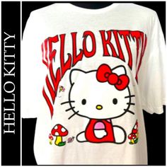 Unisex White Hello Kitty Casual Tops, White Casual Hello Kitty Tops, White Cotton Hello Kitty Top, Casual White Hello Kitty Top, Red Cotton Hello Kitty T-shirt, Red Hello Kitty Cotton T-shirt, Casual Red T-shirt With Hello Kitty Print, Red Cartoon Print Graphic Tee, White 90s T-shirt With Character Print