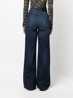 high-waisted wide-leg jeans from DONDUP featuring indigo blue, cotton blend, denim, high-waisted, belt loops, front button and zip fastening, classic five pockets and wide leg. Size Info JEANS (WAIST) Color Detail Blue Made In Italy Material Outer: Cotton 92%, Elastomultiester 6%, Elastane 2% Lining: Polyester 65%, Cotton 35% Season One Fall-Winter Season Two Fall-Winter Product jeans Brand Dondup Size And Fit This piece fits true to size. We recommend you get your regular sizeModel is 1,75m / 5 Modern Blue Flare Jeans With Belt Loops, Modern Blue Flare Jeans, Modern Denim Blue Flare Jeans With Belt Loops, Modern Denim Flare Jeans With Belt Loops, Denim Blue Wide Leg Jeans With Belt Loops, High-rise Wide-leg Denim Blue Pants With Five Pockets, High-rise Wide Leg Denim Blue Pants With Five Pockets, High Rise Wide Leg Pants In Denim Blue, Denim Blue Flare Jeans Full Length