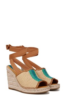 A double layer of braided jute adds tropical lift to a boho leather sandal detailed with tiny gleaming studs on the heel straps. 2" heel; 1 1/4" platform (size 8.5) Adjustable strap with hook-and-loop closure Leather upper/synthetic lining and sole Imported Women's Shoes Natural Color Wedge Heel Sandals With Heel Strap, Espadrille Sandals With Woven Sole And Wedge Heel, Woven Sole Ankle Strap Wedge Sandals For Vacation, Wedge Heel Sandals With Woven Straw Sole, Straw Wedge Heel Sandals With Woven Sole, Straw Wedge Sandals With Woven Sole, Straw Sandals With Woven Sole And Wedge Heel, Adjustable Wedge Sandals With Woven Sole, Vacation Wedge Sandals With Heel Strap Medium Width