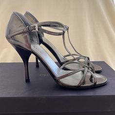 Brand New Never Worn Prada Heels. 100% Authentic. Will Ship With 1 Prada Dust Bag. Heel Height Is 4”. Silver Heels With Silver-tone Hardware For Evening, Luxury Evening Heels With Silver-tone Hardware, Luxury Silver-tone Heels For Evening, Elegant Metallic Silver Heels With Heel Strap, Silver Heels For Evening, Elegant Metallic Silver Heels For Evening, Luxury Heels With Silver-tone Hardware For Party, Designer Metallic Heels For Evening, Luxury Party Heels With Silver-tone Hardware