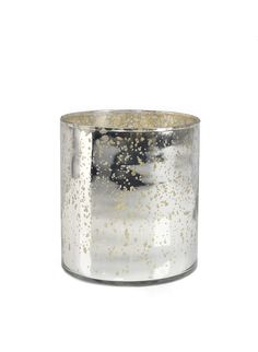 a silver candle holder with gold speckles on the top and bottom, against a white background