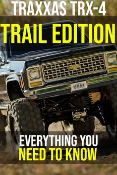 a truck driving down a dirt road with the words traxas trx 4 trail edition