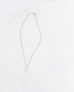 This delicate necklace has a mini hexagon pendant on a cascading chain, creating a floating effective on the neckline. A best seller and a great addition to your minimalist collection, this necklace can be worn two ways: pearl on one side and solid gold on the other. This 14K gold necklace makes a wonderful gift for yourself and others. Details: Dimensions: 16 in chain length, .25in width of hexagon Sterling Silver plated in 14K Gold Nickel free Made in New York City Made by Sophie Blake, her pa Hexagon Pendant, Hexagon Necklace, 14k Gold Necklace, Delicate Necklace, Gold Pearl, Chain Lengths, Best Seller, Chain Length, Solid Gold