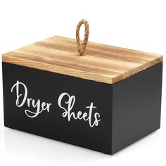 a black box with the words dryer sheets on it and a rope hanging from the top