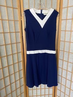 "Finnegan California dress, navy and whit with a matching jacket Bust: 40\" Waist: 30\" Hips: any up to 50\" Shoulder to waist: 16\" Waist to hem: 23\"" Retro Navy Dress For Spring, Navy Retro Dress For Formal Occasions, Vintage Navy Dress For Formal Occasions, Classic Navy Spring Dress, Retro Navy Dress For Formal Occasions, Navy Vintage Style Formal Dress, Navy Lined Dress For Formal Occasions, Navy Retro Dress For Work, Navy Retro Formal Dress