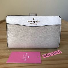 100% Authentic Kate Spade K6396 Leila Colorblock Medium Compact Bifold Wallet Light Sand And Gold Hardware **Brand New With Tags** 5 3/4” L X 3.5” H Cream Leather Bifold Wallet, Modern White Wallet With Rfid Blocking, Modern White Leather Wallet, Modern White Bifold Wallet, White Rfid Blocking Wallets, White Rfid Blocking Wallets For Everyday, White Bifold Wallet With Card Slots, Cream Bifold Wallet With Interior Card Slots, White Kate Spade Wallet For Everyday Use