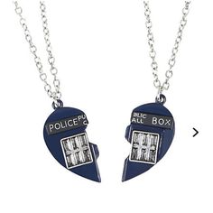 two necklaces with police badges attached to them on a white background, one is blue and the other is silver