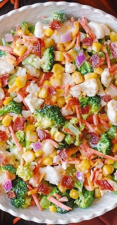 Creamy Broccoli and Cauliflower Salad with Corn, Bacon, Carrots, and Cheddar Bacon Carrots, Broccoli And Cauliflower Salad, Julia's Album, Salad With Corn, Sliced Carrots, Broccoli Cauliflower Salad, Healthy Broccoli, Broccoli And Cauliflower, Creamy Broccoli