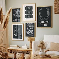 a living room filled with furniture and pictures on the wall