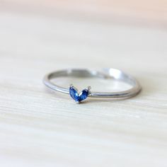 Our Dainty Silver Heart Ring is a single band sterling silver ring with blue zirconias on top. It is also adjustable from the bottom so you can easily fit it to your measurements. This dainty, tiny, minimalist-style ring can be worn daily as well as on special occasions. Dainty Silver Rings, Blue Heart Ring, Enamel Rings, Silver Heart Ring, Kids Bracelets, Zircon Jewelry, Everyday Rings, Enamel Ring, Ring Dainty