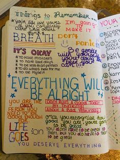 an open notebook with writing on it and the words everything will be alright written in different colors