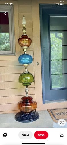 an image of a glass water fountain on the front porch