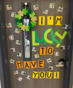 a door decorated with st patrick's day decorations and the words i'm lucky to have you