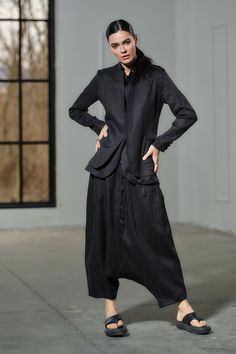 Introducing our avant-garde handmade harem pants, crafted with care from 100% pure Oeko-Tex certified linen fabric in classic black color. These pants redefine contemporary fashion with their baggy silhouette and captivating asymmetrical details. Designed for the modern woman who seeks both style and sustainability, our harem pants are a testament to minimalist urban fashion. With five pockets, they offer practicality without compromising on their unique aesthetic appeal. In addition to their re Black Linen Pants For Fall, Baggy Linen Harem Pants For Fall, Fall Linen Harem Pants With Pockets, Baggy Outfits Aesthetic, Women Linen Clothing, Harem Pants Outfit, Linen Harem Pants, Black Clothes, Drop Crotch Pants