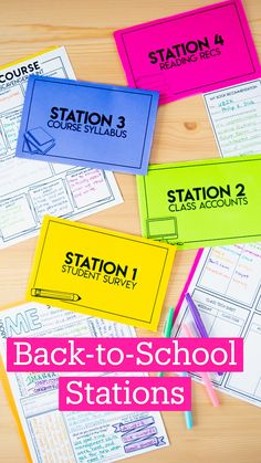 four station cards with pencils on top of them and some writing paper next to them