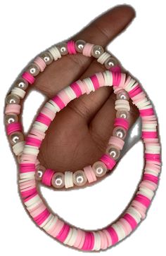 Trendy Heishi Beaded Bracelets, Trendy Plastic Beaded Bracelets For Beach, Trendy Heishi Beads Stretch Bracelet, Trendy Pink Heishi Beads, Trendy Pink Hand-strung Beads, Trendy Hand-strung Pink Beads, Trendy Handmade Plastic Beaded Bracelets, Handmade Trendy Plastic Beaded Bracelets, Pink Trendy Hand-strung Stretch Bracelet