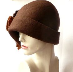 Felt hat cloche hat felt hat felted hat Retro hat La belle epoque Art Deco 1920s hat Art Hats Brown hat cloche hat 1920's woman hat roses Wool Merino wool Handmade Great, very flattering brown hat with roses in shades of brown color ! Soft and durable ! Adapts to the head ! Special and unique ! Sophisticated and elegant ! As the base for my works I use great materials like highest quality Australian merino wool (18 micro). All my works are made by hand in the process of long-term, hand felting M Fitted Wool Cloche Hat, Retro Cloche Felt Hat For Winter, Vintage Fur Felt Cloche Hat For Winter, Retro Winter Cloche Felt Hat, Vintage Cloche Hat For Winter, Fitted Vintage Fur Felt Cloche Hat, Brown Fur Felt Cloche Hat, Fitted Felt Cap For Fall, Winter Fitted Cloche Hat In Fur Felt