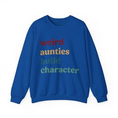 a blue sweatshirt with the words weird, aurities, build character on it