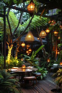 an outdoor dining area with lights hanging from the ceiling and potted plants in the background