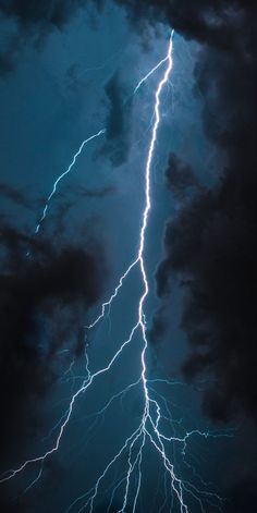 a lightning bolt striking through the dark clouds