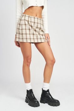 Add style to your wardrobe with this Square Printed Mini Skirt. Crafted from 100% polyester fabric for a comfortable fit, with a fully lined interior for added coverage. 💁‍♀️😍 SIZE & FIT :MODEL WEARS SIZE SMALLMODEL'S HEIGHT 5'9 Made In: IMPORTED Fabric Contents: 100% POLYESTERLINING: 100% POLYESTER Emory Park is a Young Contemporary clothing brand based in Los Angeles. We are committed to produce styles that are effortless and trendy using high quality fabrics. Our mission is to design clothe Flannel Skirt, Printed Mini Skirt, Brown Flannel, Park Square, Contemporary Clothing, Cardigan Sweater Coat, Denim Accessories, Plaid Mini Skirt, Contemporary Outfits