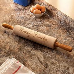 This personalized gourmet rolling pin makes a unique gift for anyone who loves to cook or spend time in the kitchen! Add some zest to the kitchen and make cooking even more fun with a customized rolling pin! A rolling pin is a kitchen basic that every cook needs. This customized gourmet rolling pin is made with waxed hardwood barrels and features a full-length steel axle that runs through self-lubricating nylon bearings guaranteeing a lifetime of smooth rolling. Make this rolling pin truly one-o Rolling Pin Hooks, Rolling Pin Recipe Holder, Transfers On Rolling Pins, Rolling Pin Display Hangers, Wooden Rolling Pin Display, Hobby Lobby Rolling Pin, Old Rolling Pins Display, Decoupaged Rolling Pins, Personalized Cookie Jar