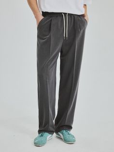 This is a comfortable pants that is made out of high quality polyester, rayon, and spandex blend fabric. With minimal design detail of semi wide silhouette, elastic waistband, and tentar and tumble wahsed fabric, it gives a comfortable and trendy mood. - Semi wide silhouette- Elastic waistband with string- Tentar and tumble washed fabric Versatile Relaxed Fit Dress Pants With Elastic Waistband, Casual Straight Leg Dress Pants With Pull-on Style, Casual Pull-on Straight Leg Dress Pants, Casual Wide Leg Pants With Comfort Stretch, Relaxed Fit Wide-leg Dress Pants With Elastic Waistband, Casual Tapered Leg Pull-on Dress Pants, Casual Dress Pants With Elastic Waistband And Tapered Leg, Comfort Stretch Trousers With Elastic Waistband, Casual Wide-leg Dress Pants With Elastic Waistband